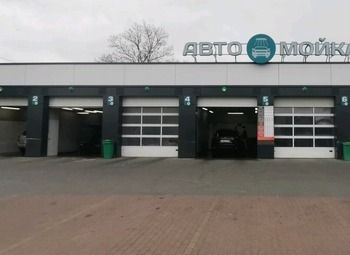 Фото Стоянка с мойкой и автосервисом на севере города