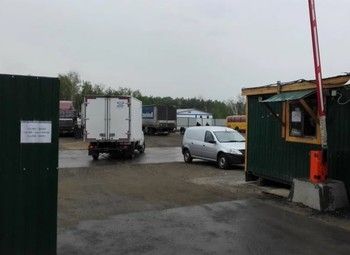 Фото Автостоянка/участок в аренду под грузовой и легковой транспорт
