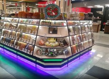 Фото Магазин-островок в ТЦ / Продажа орехов и сухофруктов